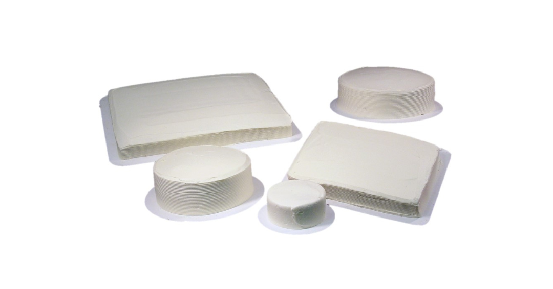 Collection of rectangle and circle white iced cakes