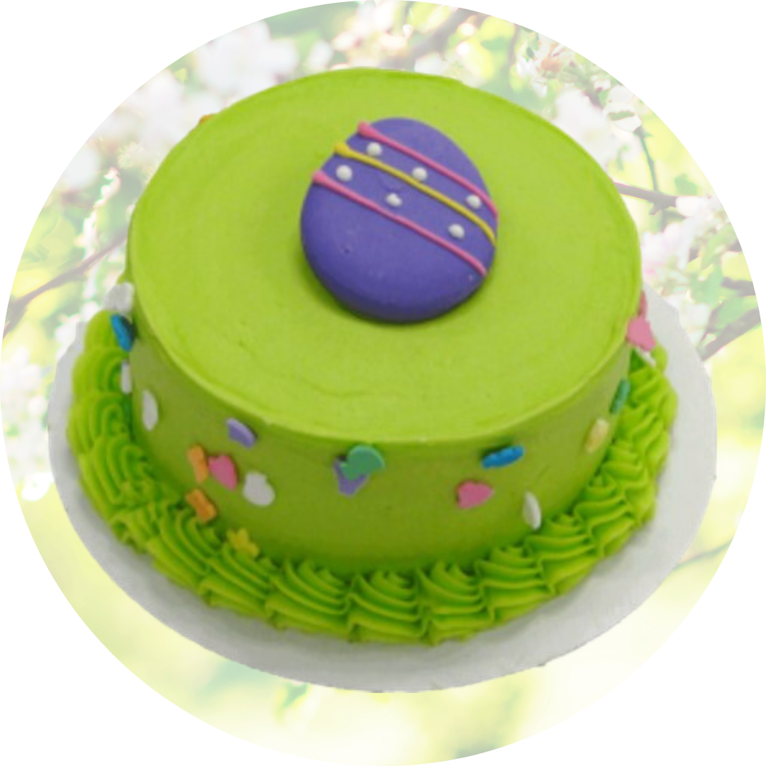 Green cake with purple egg decoration