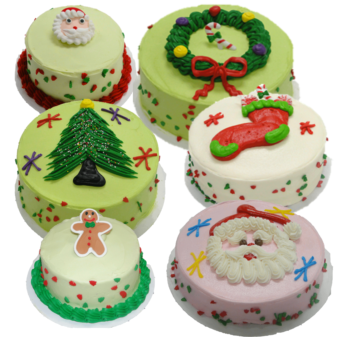 Six Christmas cakes with various thematic decorations